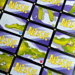 Componentes del juego de mesa Nessie en Español por la editorial 2 Tomatoes Games